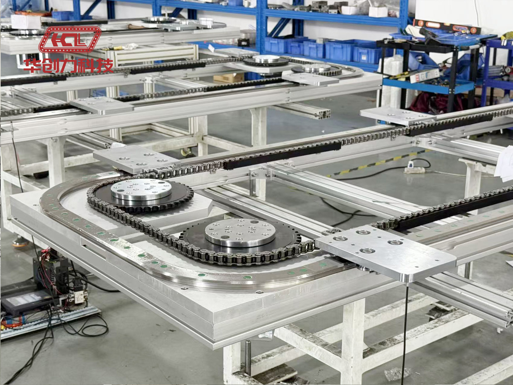 从“海上巨无霸”到“陆上主动脉”：华创力科技环形导轨输送线，护航中国智造出海新时代